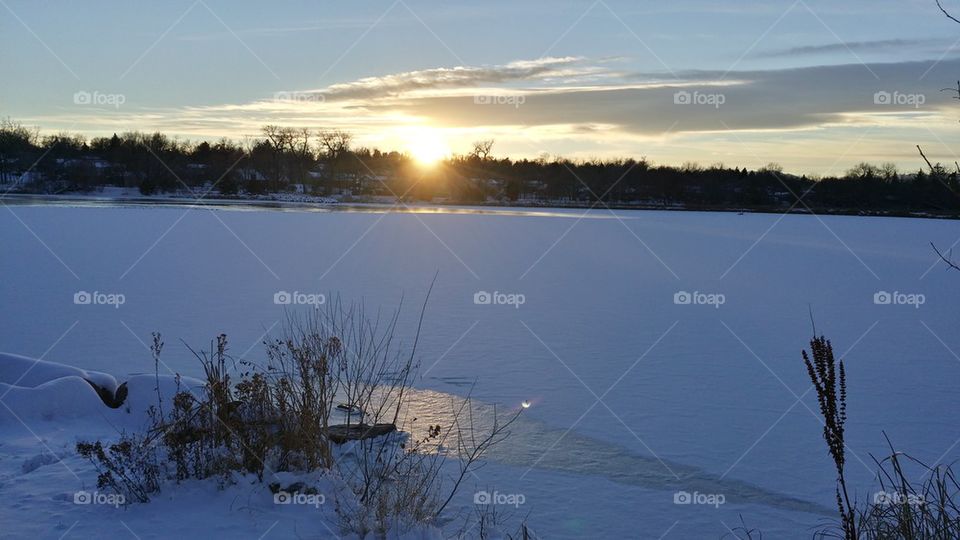 snowy lake sunset