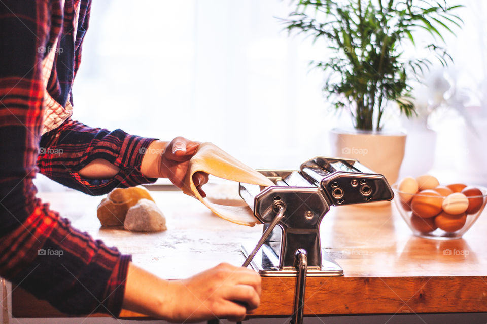 woman making fresh pasta