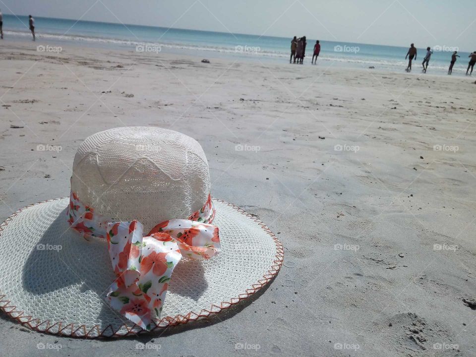 hat at beach