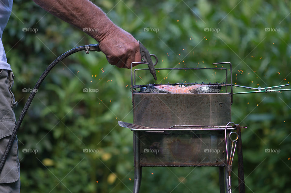 Roasted salmon on bbq grill for picnic
