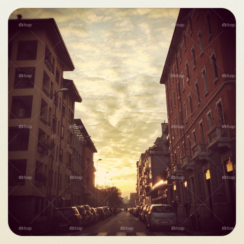 sky milano sunset clouds by adrianocastelli