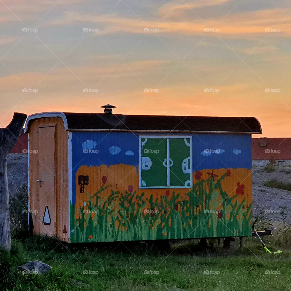 Painted site hut, In a residential area.