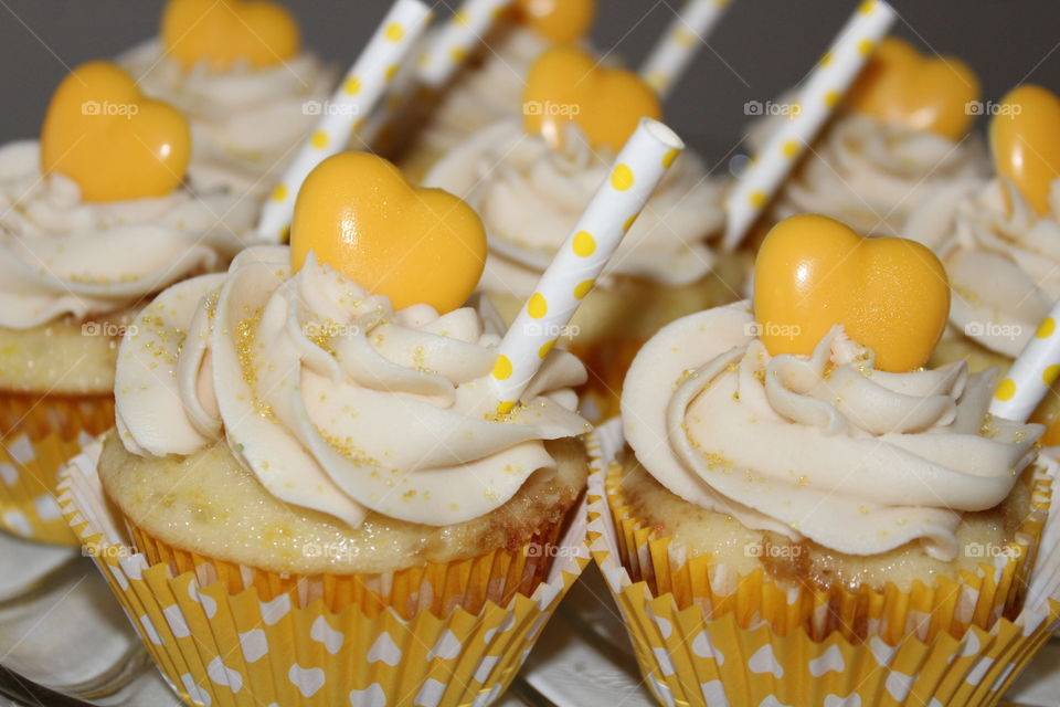 White cupcake drizzled with coffee syrup, tiramisu filled and topping with Kahlua buttercream 