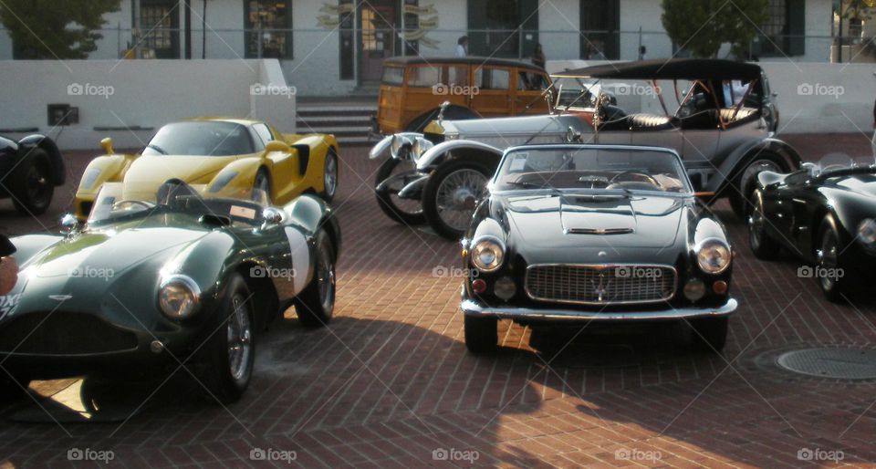 cars on display in California courtyard for classic car show