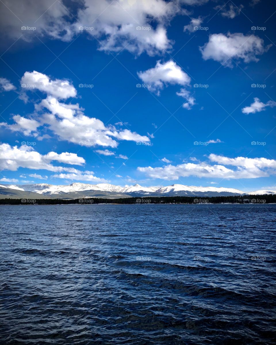The great mountain range across the lake.