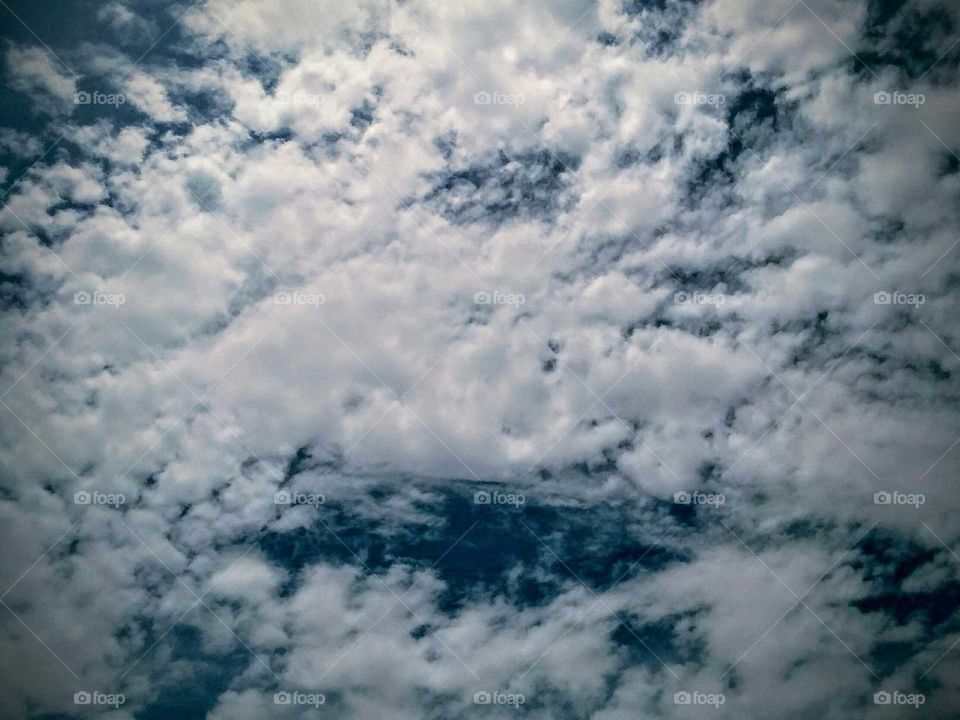 Clouds in a Deep Blue Sky