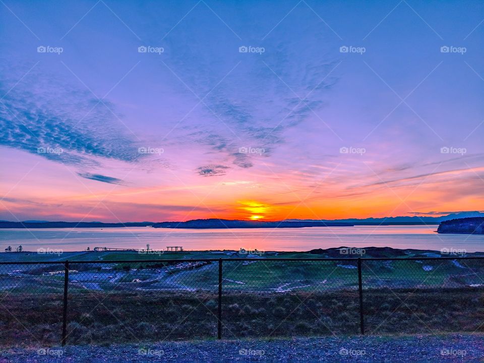 beautifully vivid sunset over Chambers Bay golf course