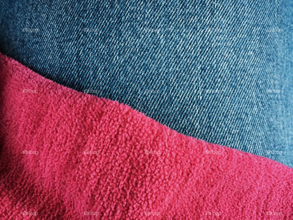 Pink Fleece on Denim. Pink fleece on denim creating a unique background