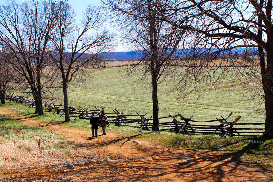 Antietam
The sun shines down on the battlefields of the past through the lens of the present. We focus on what happened here: the blood spilled, the lives lost, the causes fought for, and the significance of that day in a war long past. Antietam is not just a name. It is place in time and in history. In the single bloodiest day in American history brothers in arms fought each other over fields, roads, and bridges where 22,000 casualties fell. The dead lay thick in the road like logs and the corn was cut like a razor. From Artillery Hell, to Bloody Lane, to Burnside's Bridge they fought for the future of two nations and one country. Valor, Bravery, Honor: These are just a few of the words that describe that day. May the souls of those who fought here find peace.