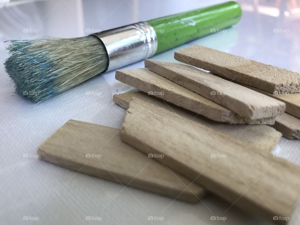 Paintbrush and wooden block