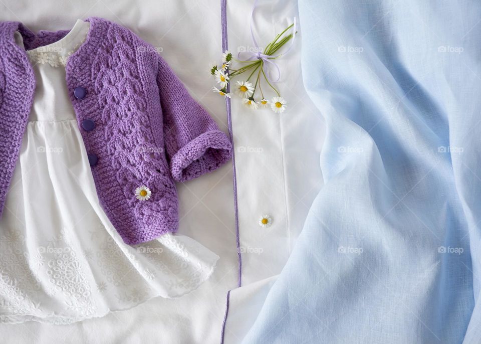 Baby girl clothes with daisy flowers 