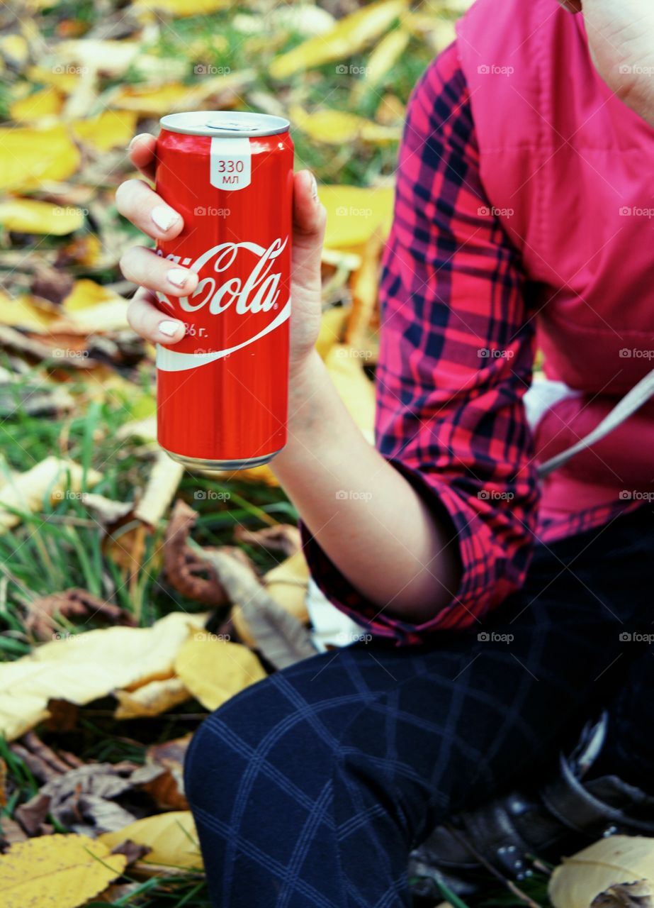 coca cola in the hands girl teenage outdoor