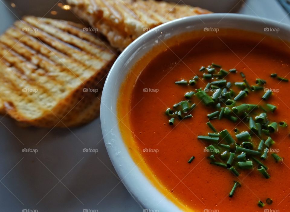 Comfort Food. Tomato Soup And Grilled Cheese Sandwich On A Rainy Day
