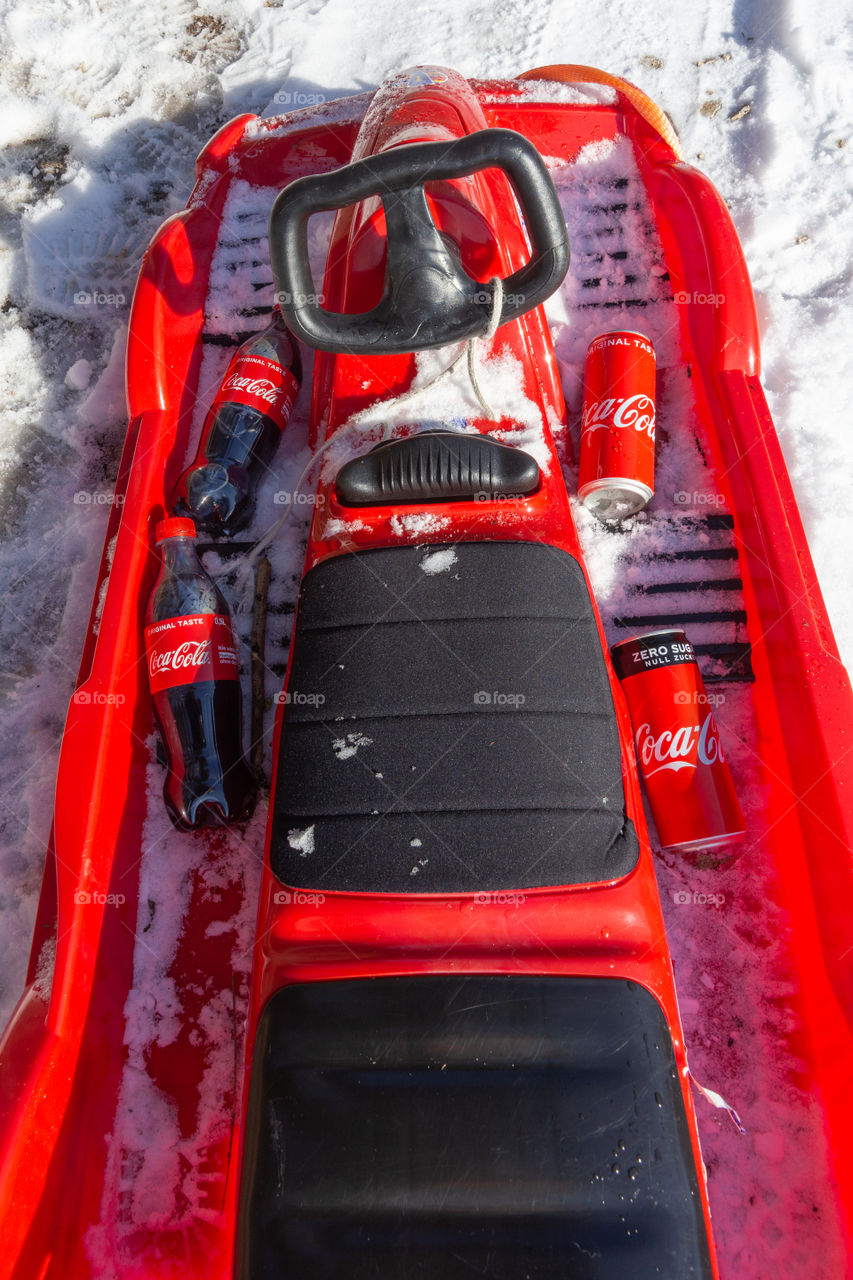 red bob sledge with Coca Cola