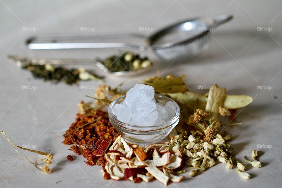 Close-up of sugar bowl on herbs
