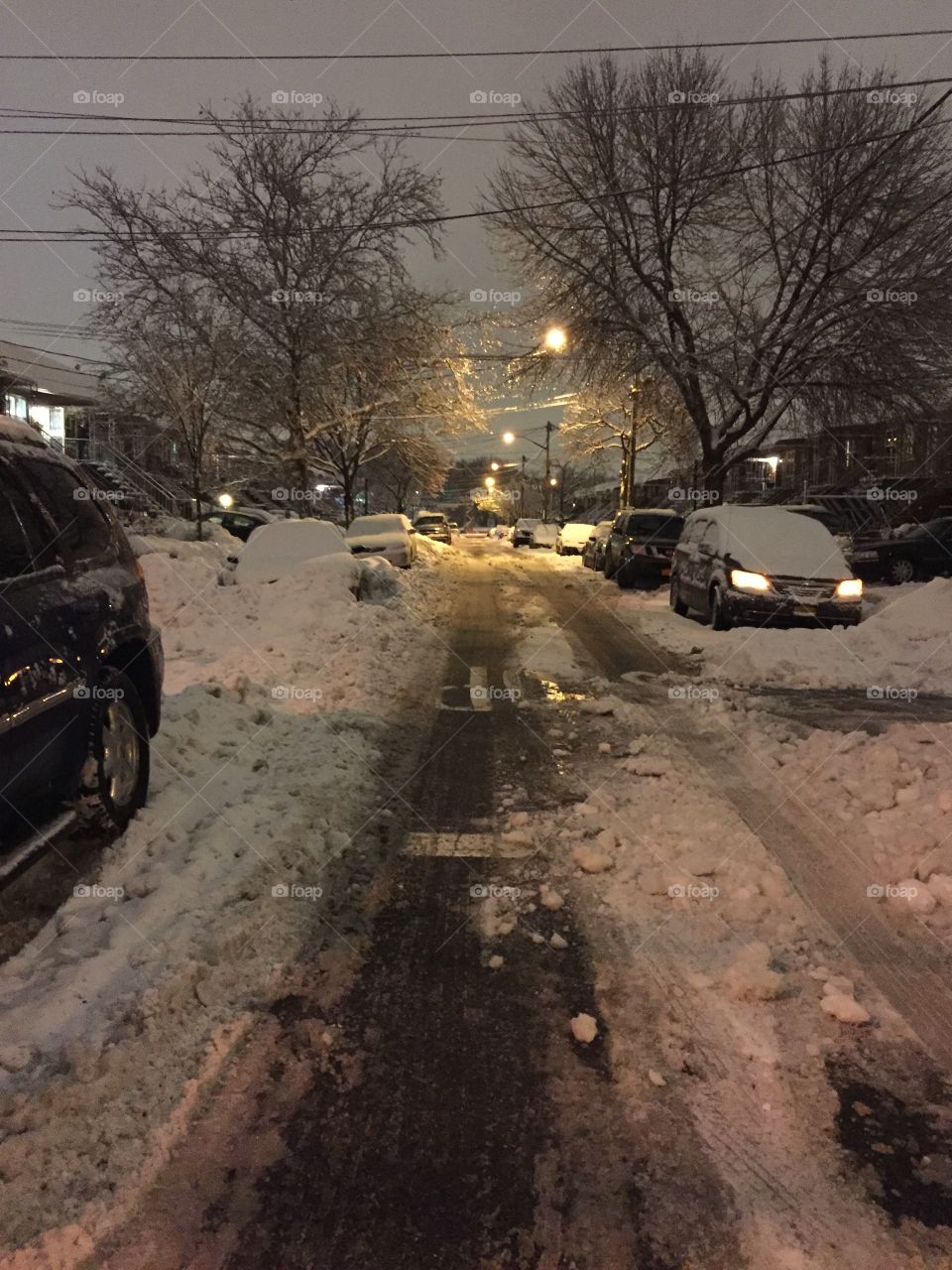 Queens NYC Street Night after blizzard snowstorm 