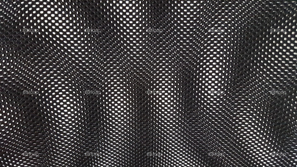 Creative texture - black and white holes, abstract pattern 