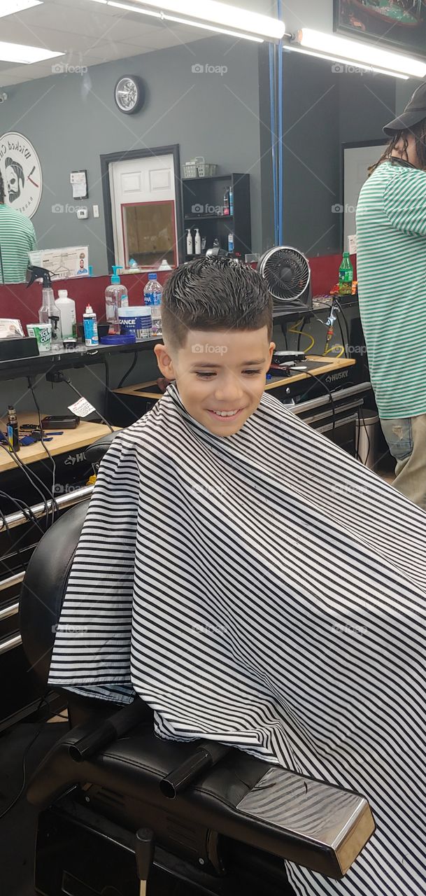 boy getting haircut