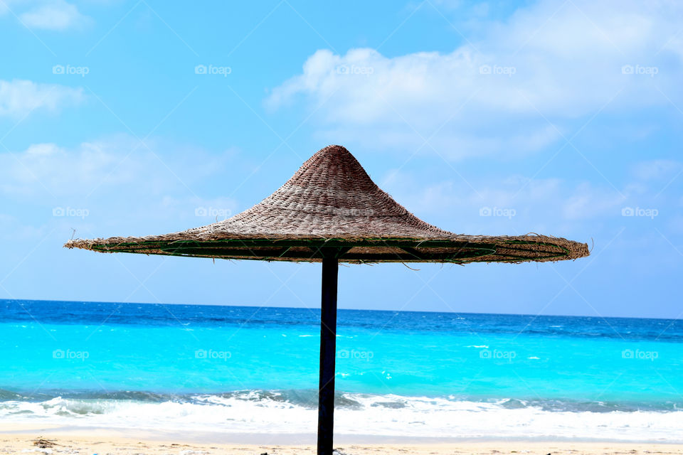 Thatched roof on beach