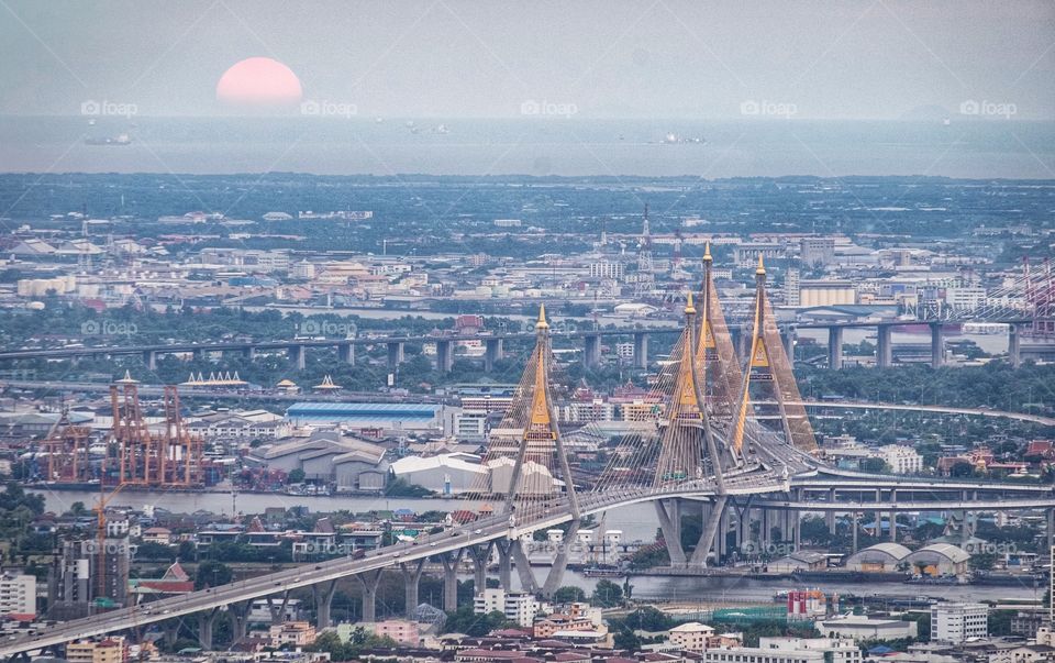 Sunrise over the beautiful landmark bridge in Bangkok Thailand