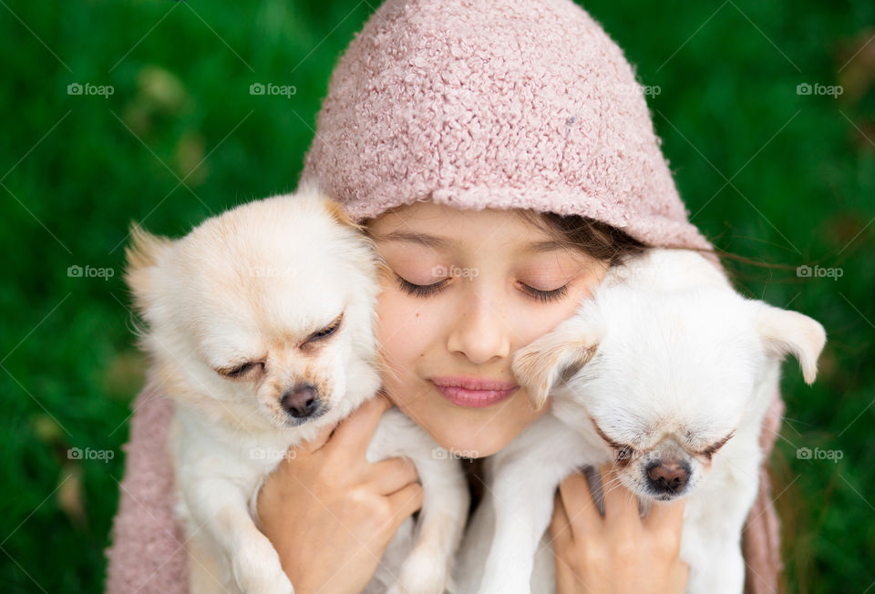 Girl with two little dogs 