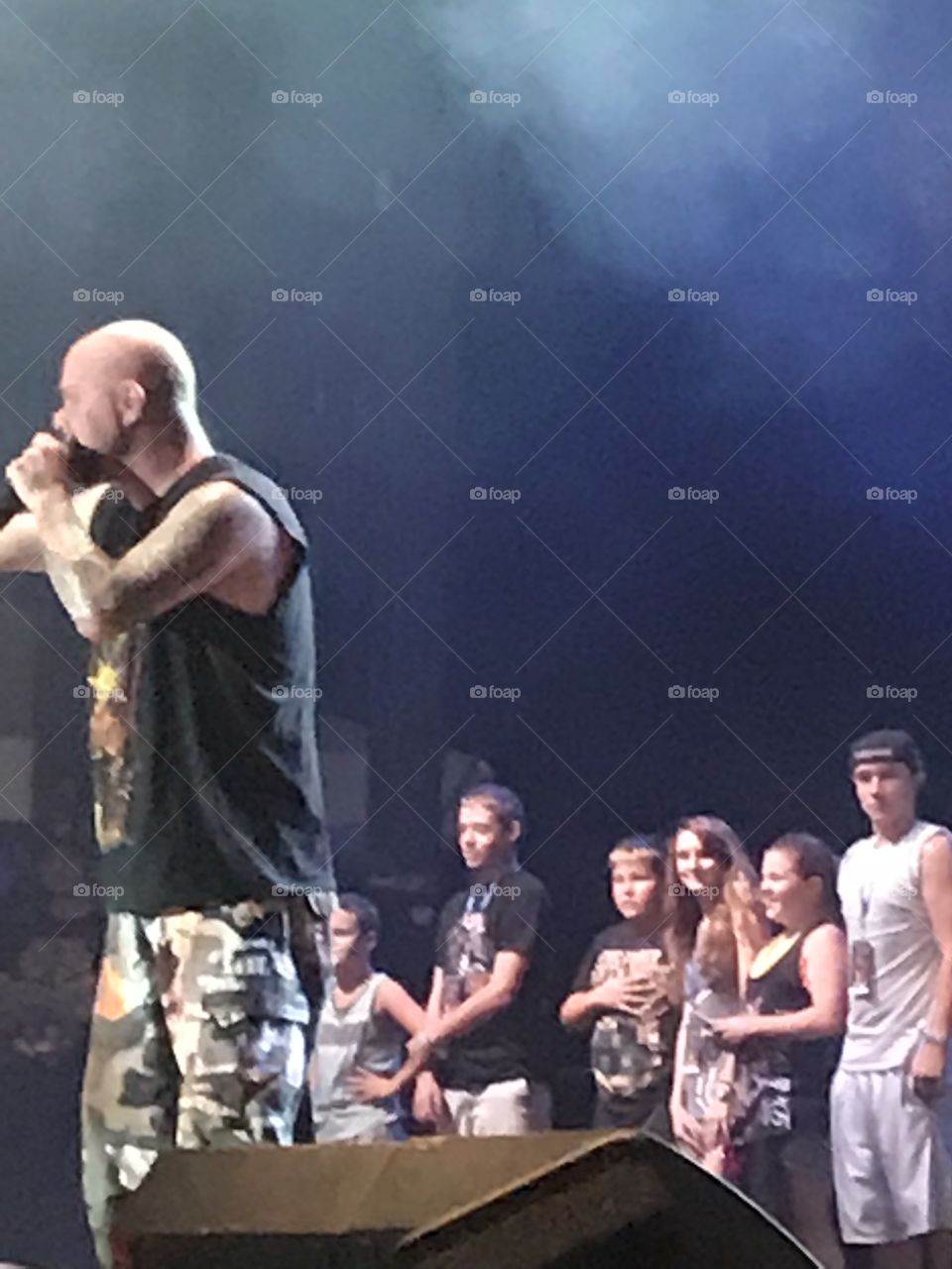 Ivan Moody getting kids on stage to get them out of the mosh pit. Moonstock 2017