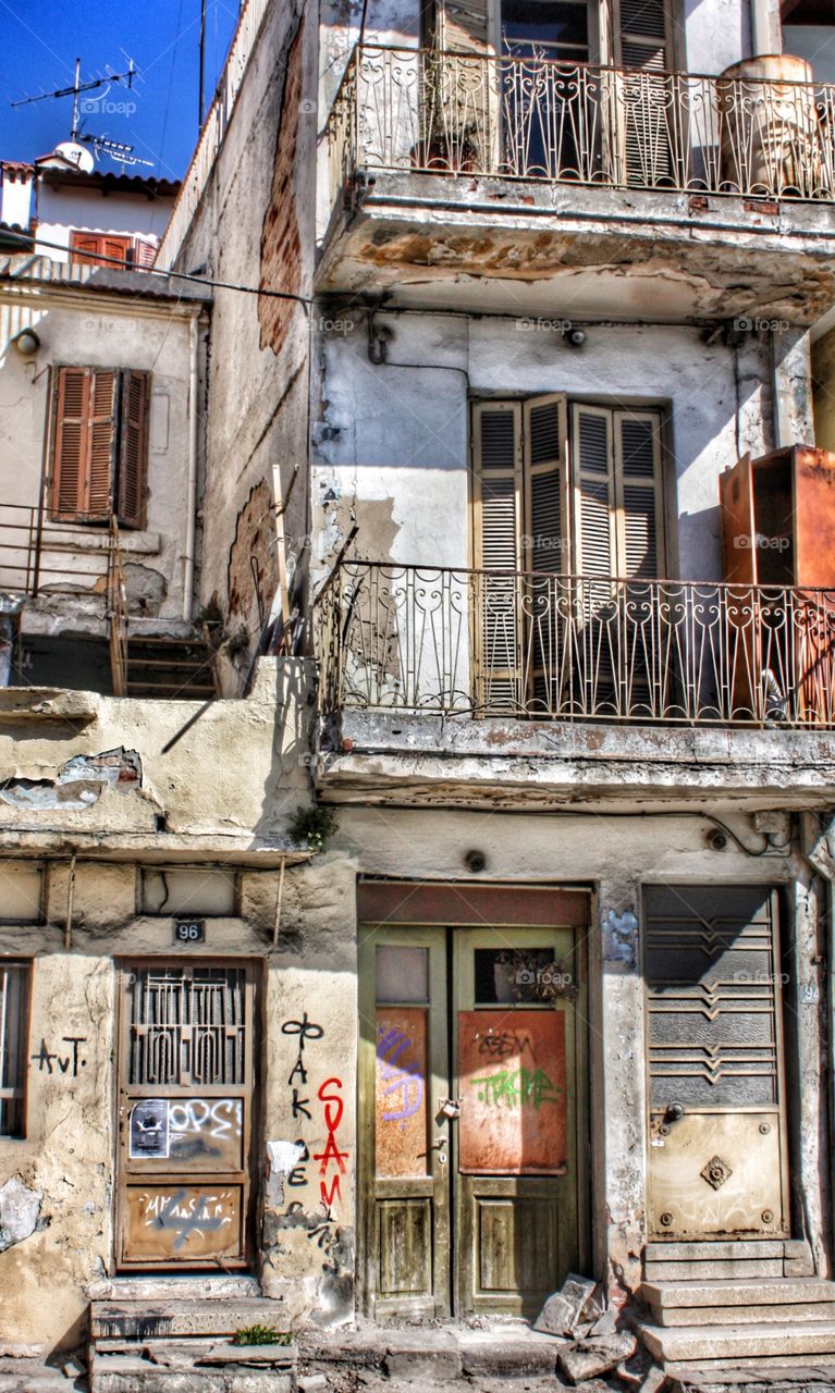 Derelict windows. Windows of old ,derelict buildings in thessaloniki Greece .