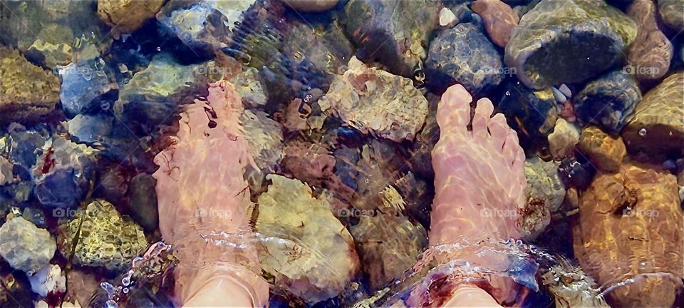 Nothing is more refreshing on a hot summer day than dipping one’s feet into the cool ocean water as is done here at the “Strelasund”, a part of the “Baltic Sea” in “Mecklenburg - Western Pomerania”, Germany. 2024. Hypnotic Productions