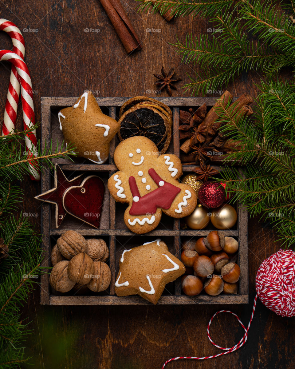 Christmas decorations and food in w box, top view