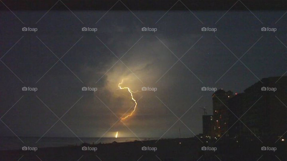 Thunderstorm at the Beach. Nighttime thunderstorm in Orange Beach Alabama.