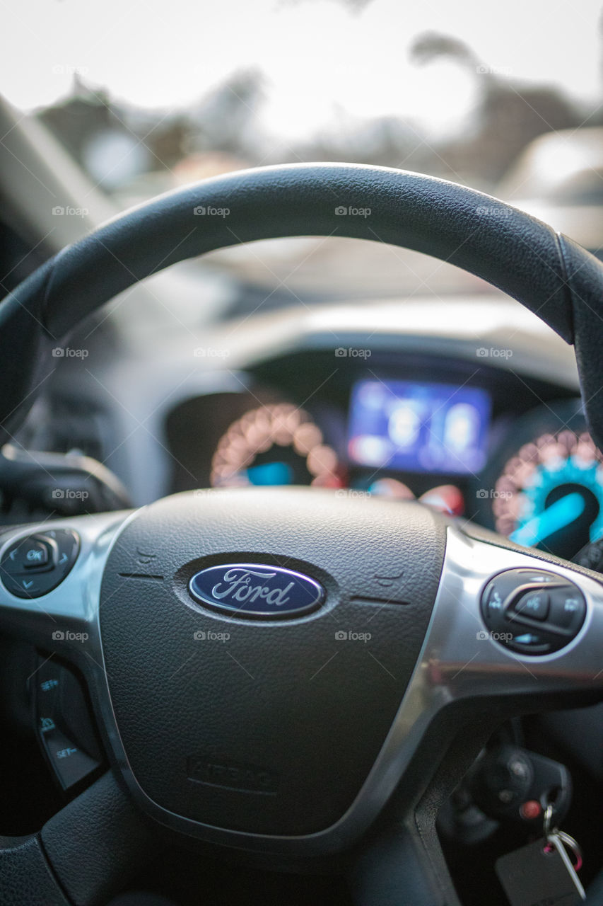 Photograph of a Ford steering wheel. 