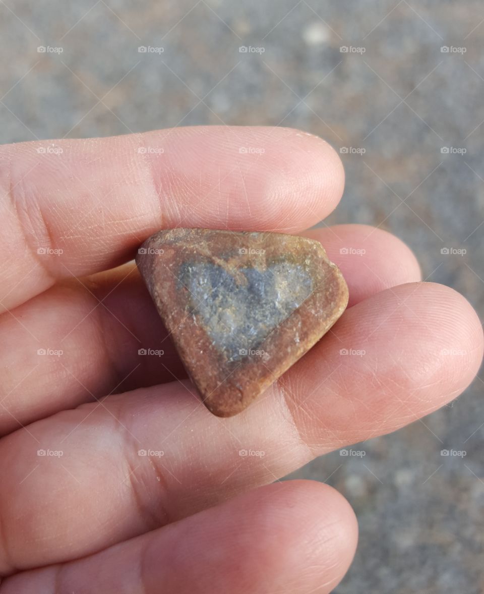 On a walk I found this broken rock. heart shaped.