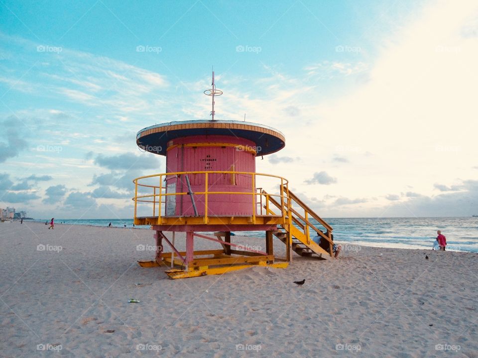A pink Lifeguard shelter in the Miami beach in Sunrise 