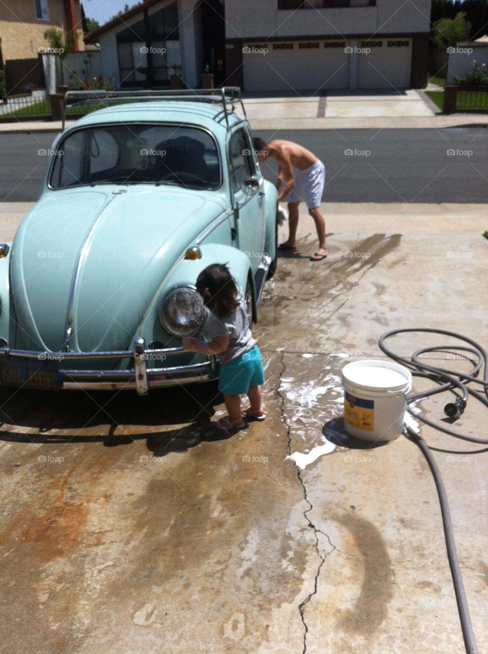 father & daughter car wash