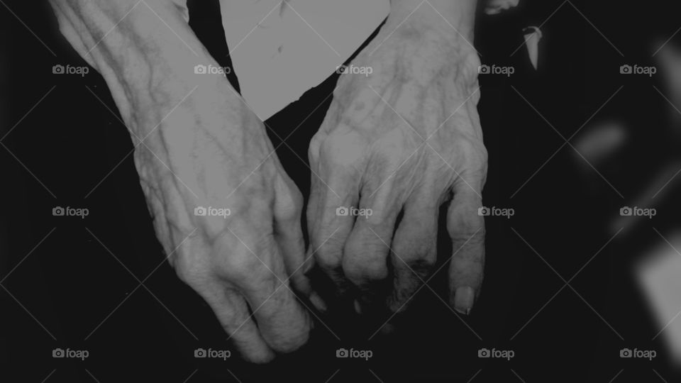 The hands of a woman who never avoided an adventure, but now suffers from Alzheimers.