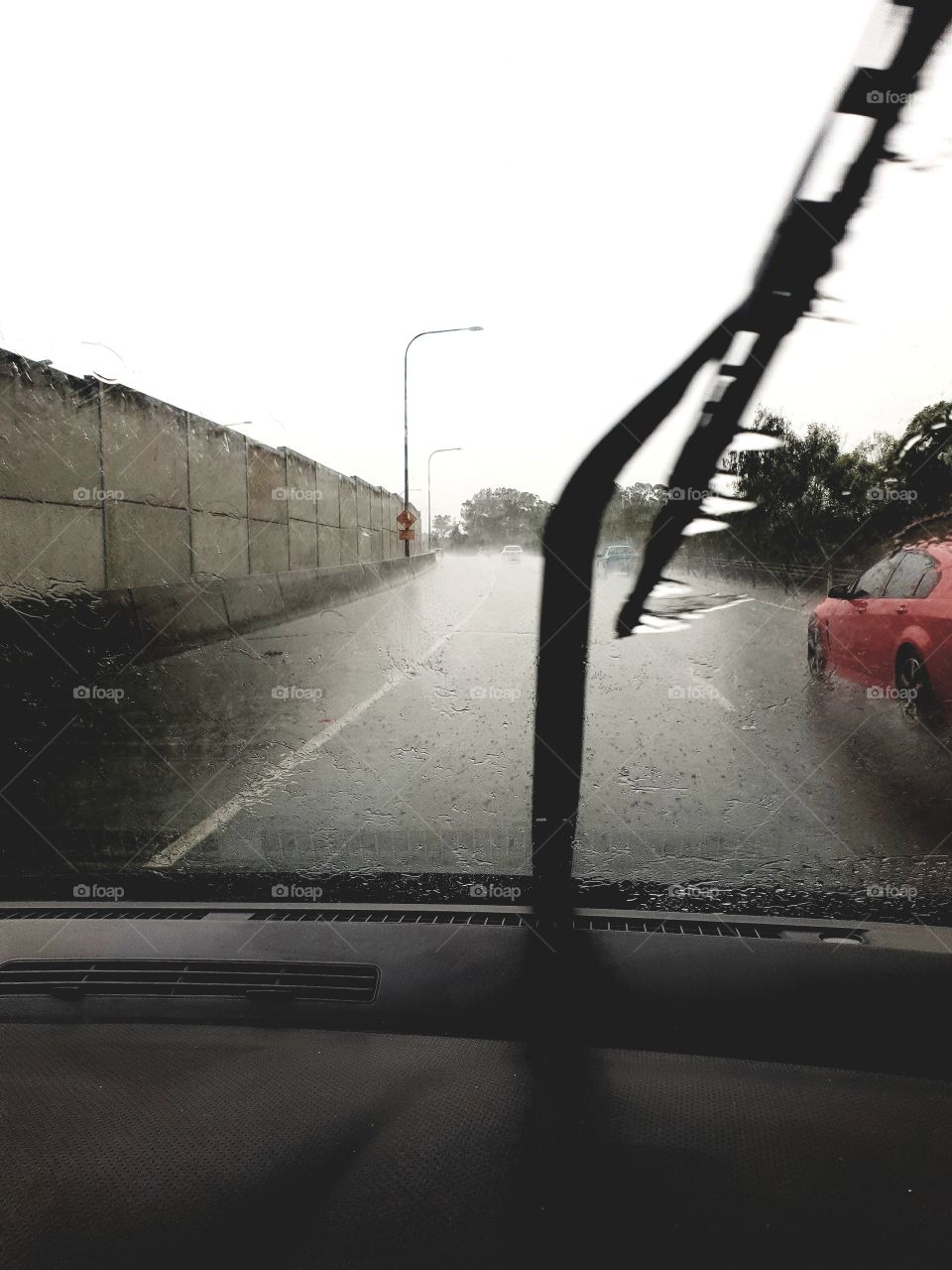 heavy rain Brisbane road