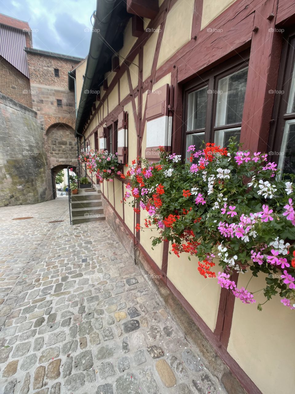 Windows with flowers next to the Nurmberg castle, Germany