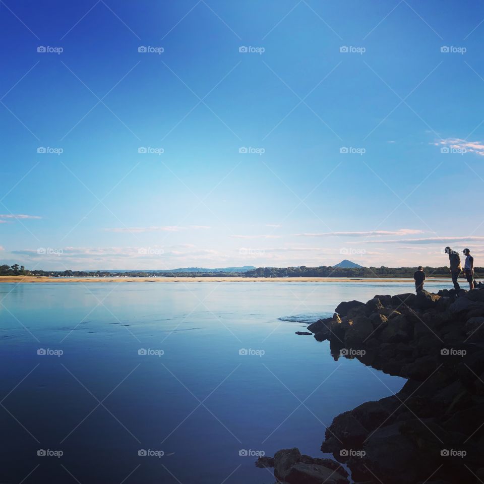 Late afternoon on the river reflections in blue 