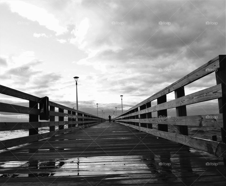 Happy grey story a cloudy day at the pier