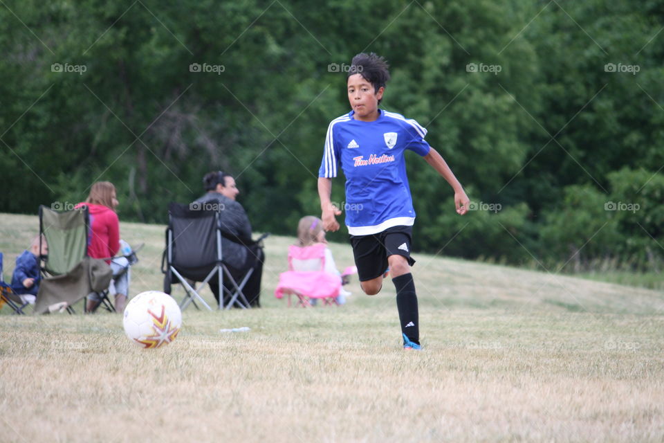 Playing soccer