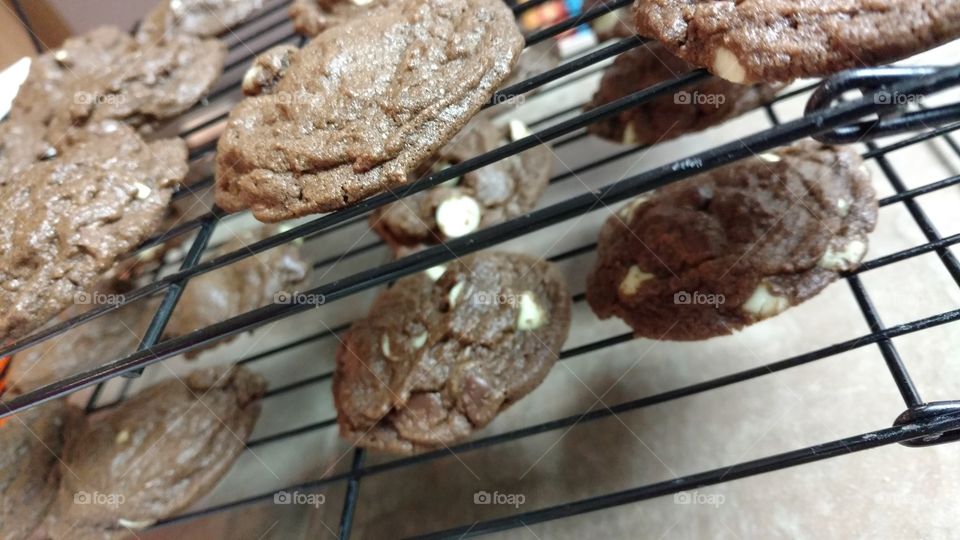chocolate mint chip cookies on a wire rack