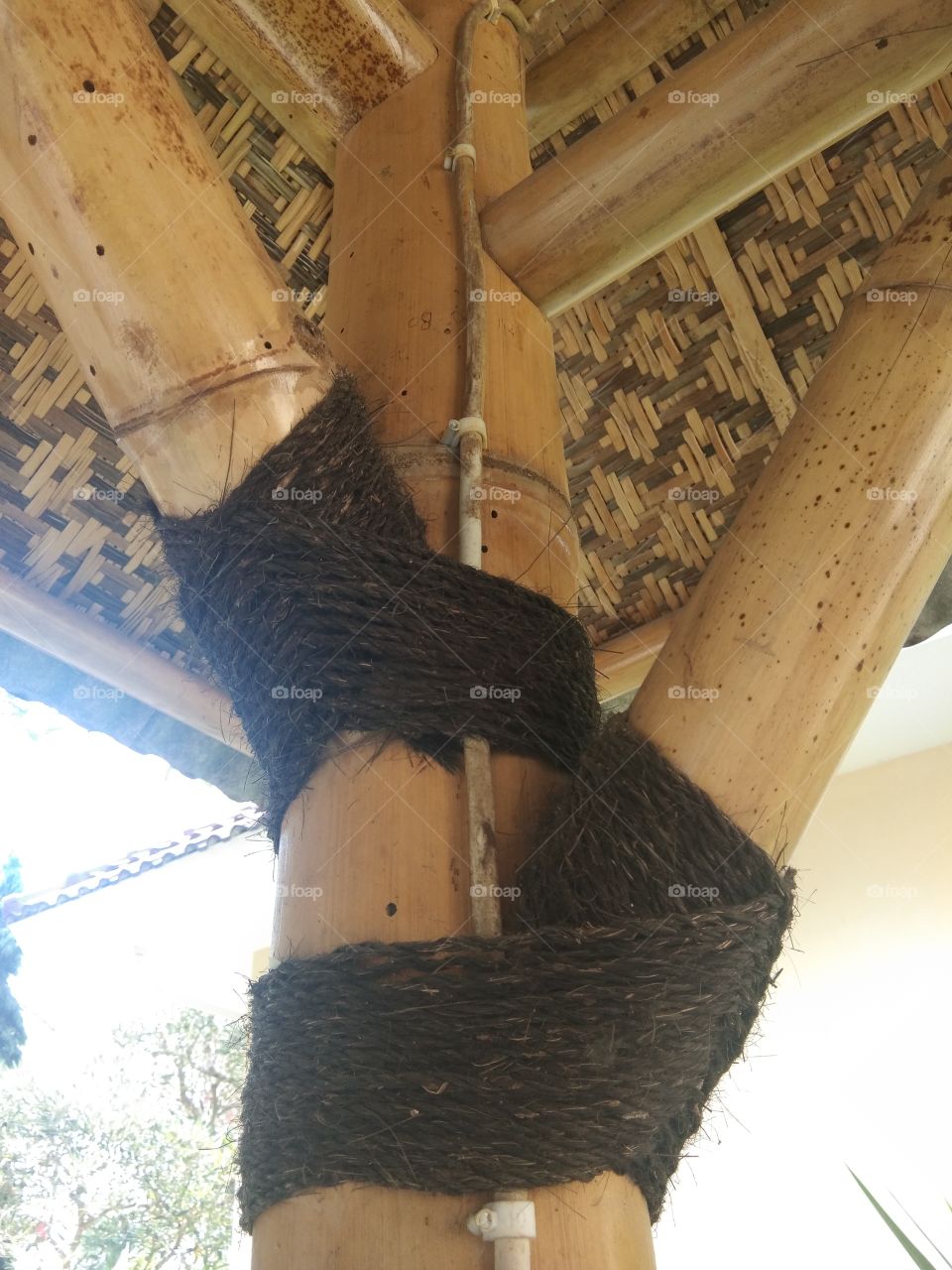 connection ties of bamboo buildings with black palm fibers