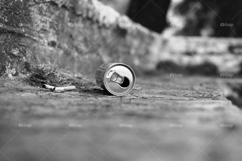 metal can on the ground garbage