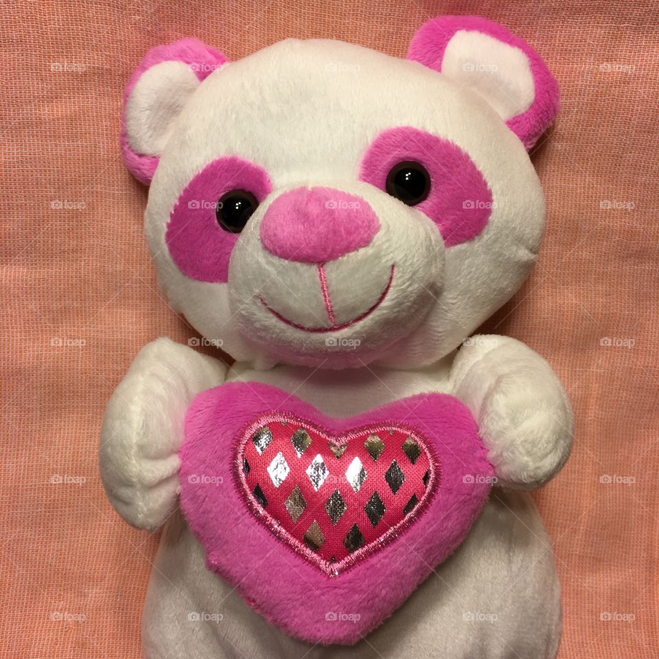 Cute bear with lovely heart 