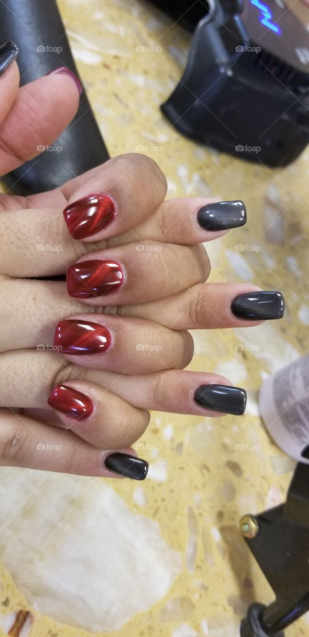 Red cat-eye and Onyx manicure