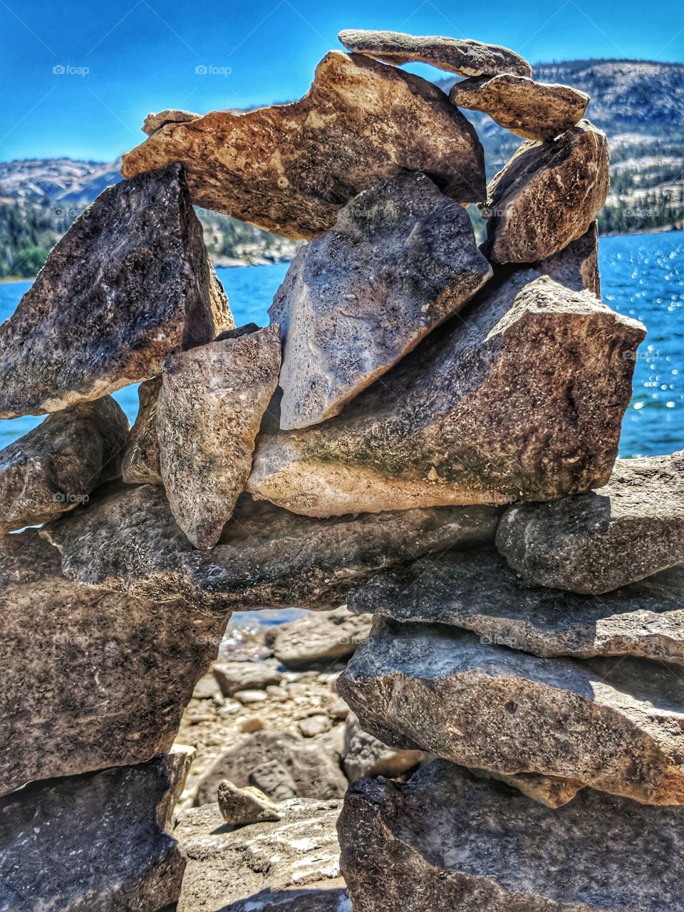 Stacked Rocks Near Lake