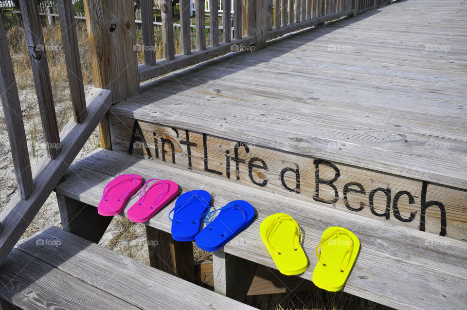 Flip flop sandals at the beach. 