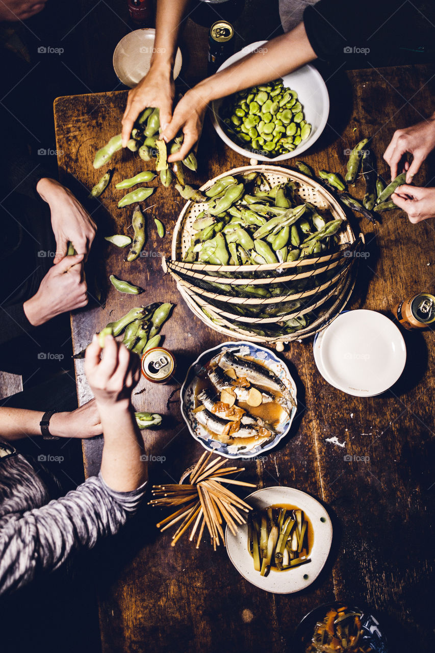 Preparing homegrown beans for dinner in Japanese country house