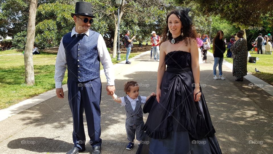 People walking in a park during a traditional festival