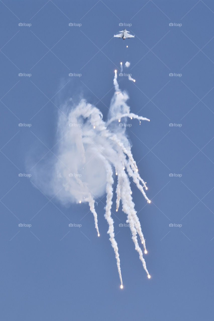 fighter plane dropping flares